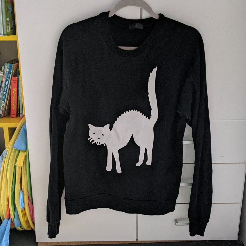 Unisex black sweatshirt with white cat - cat lover